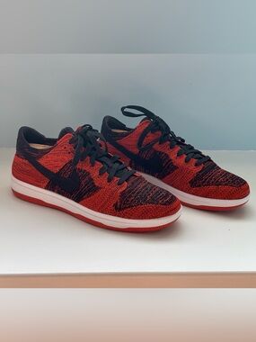 Nike Flyknit Dunk Low-Top Sneakers in Red and Black